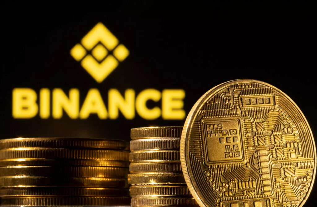 file-photo-illustration-shows-a-representation-of-cryptocurrency-and-binance-logo